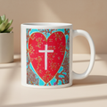 Mug with a red heart design featuring a white cross on a white background