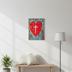 Card with a red heart and white cross on a blue and brown leafy background