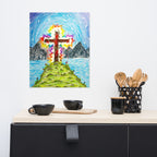 Colorful painting of a cross on an island with mountains in the background, displayed above a kitchen counter.