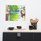 Decorative wall art with religious text on a kitchen counter.