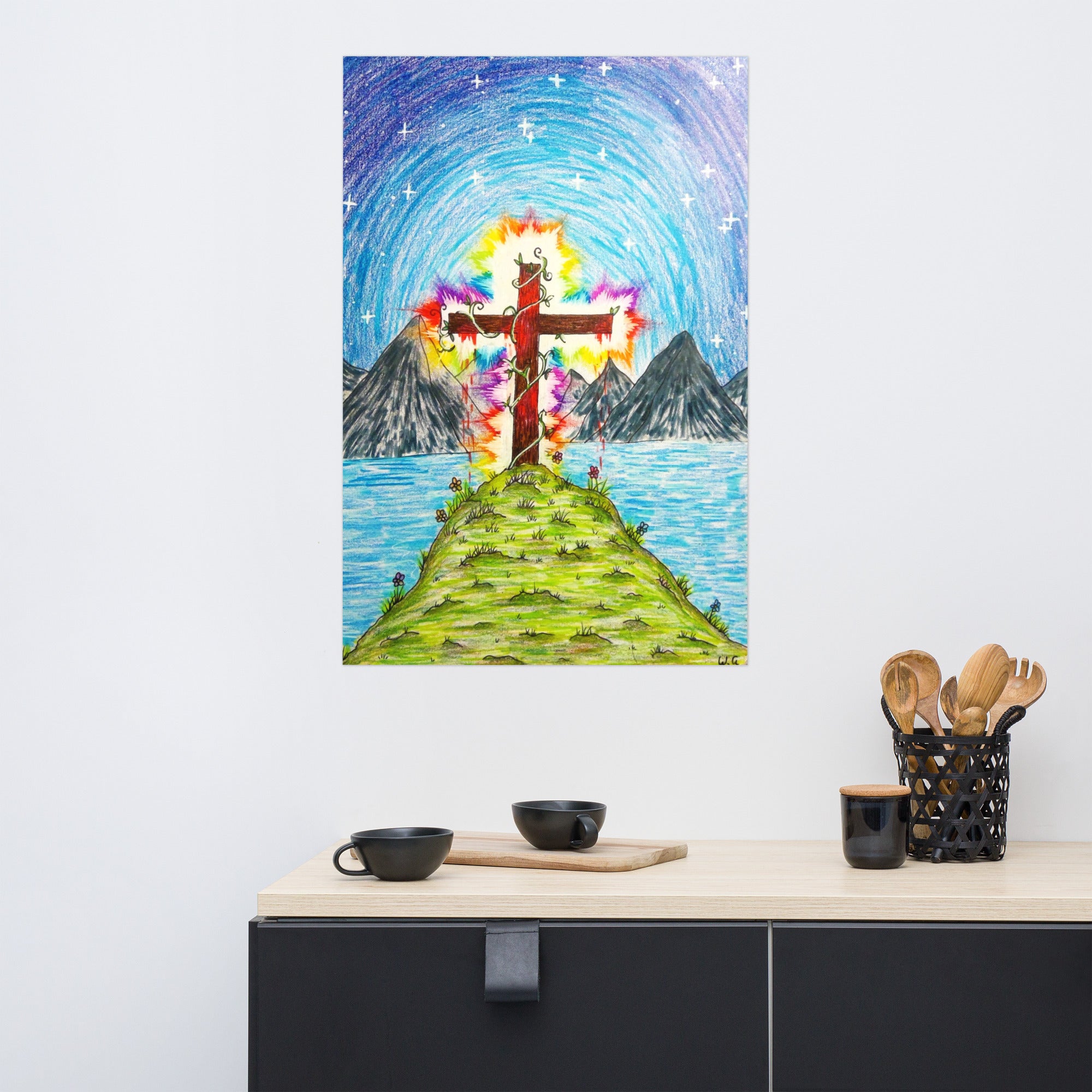 Colorful painting of a cross on an island with mountains and sky, displayed above a kitchen counter.