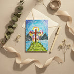 Colourful drawing of a cross on a mountain with a white envelope underneath, pinned to a string.