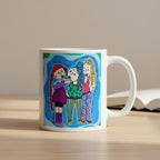 Mug with colorful illustration of three characters on a white background