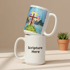 Two white mugs stacked on top of each other with one featuring a colorful artwork and the other displaying 'Scripture Here'.